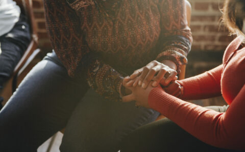 Women supporting each other